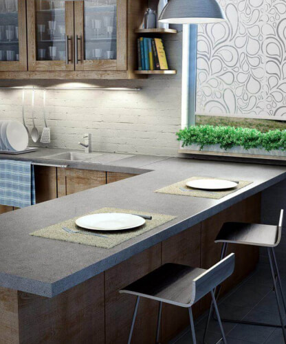Kitchen with grey stone countertop and wood cabinets