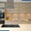 Modern kitchen with cream cabinets and quartz countertops